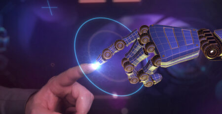 Robot and human hands touching index fingers